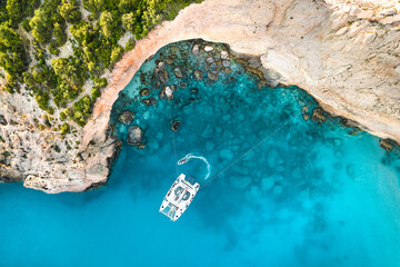 Aerial view of catamaran in bay