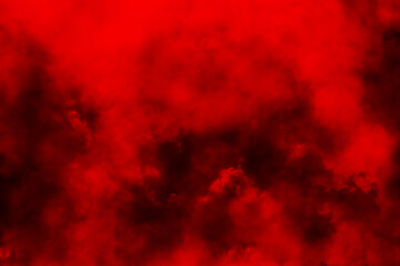 Abstract red smoke mist fog on a black background. Red Smoke on a black background. Cloudiness, mist or smog background. Red fog and smoke effect. Clouds of smoke or gas. Texture. Design element.