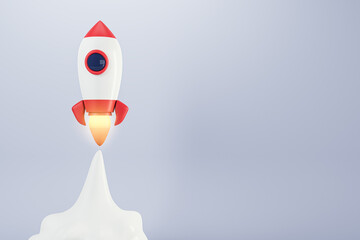 Wall Mural - startup and promotion concept with launched rocket and empty space for your logo on light background