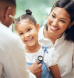 © Talia Mdlungu/peopleimages.com - Happy, doctor and mother with girl, healthcare checkup and listen to heartbeat, friendly or consultation. Physician, mama or daughter in the hospital, appointment or stethoscope for diagnosis or care