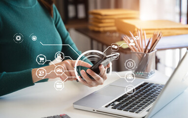 Businesswomen working with smart phone and laptop and digital tablet computer in office with digital marketing media in virtual icon.