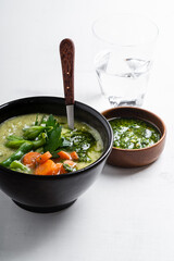 Wall Mural - Minestrone soup with parsley pesto sauce, vegetable cream soup