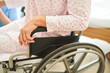 © Robert Kneschke - Senior woman sitting in wheelchair at rehab center