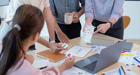 Wall Mural - Close up ux developer and ui designer brainstorming interface wireframe design.Creative digital development agency
