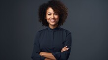 Portrait Of Happy Woman Looks In Camera. Beautiful Business Woman Professional In A Suit At Isolated Background. 