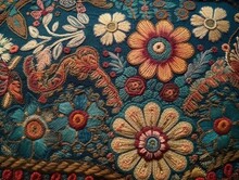 The Embroidery Depicts A Harmonious Fusion Of Geometric And Floral Elements. It Is An Intricate Tapestry Of Fine Needlework.