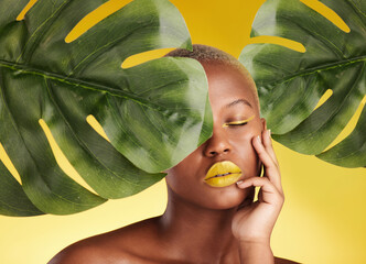 Poster - Calm black woman, makeup and leaves in skincare for natural beauty or cosmetics against a yellow studio background. Face of African female person in relax for facial treatment, lipstick or product