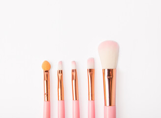 Wall Mural - Cosmetic brush for makeup on isolated on white background. Cosmetic product for make-up. Creative and cosmetic fashion concept. Fashion. Collection of cosmetic makeup brushes.banner.