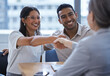 © CineLens/peopleimages.com - Couple, happy and handshake with financial consultant for deal, agreement or contract. Smile, man and woman shaking hands of broker for finance, loan or mortgage, welcome and thank you for investment