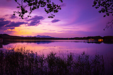 Beautiful lake in the mountains at sunset. Lake of Banyoles - Girona - Spain