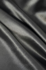 Wall Mural - Black smooth silk texture of beauty silk