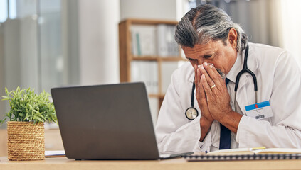 Wall Mural - Sneezing, sick and a doctor with a laptop in an office, blowing nose and an allergy at a hospital. Healthcare, medicine and a mature medical employee with a tissue with covid or a virus at work