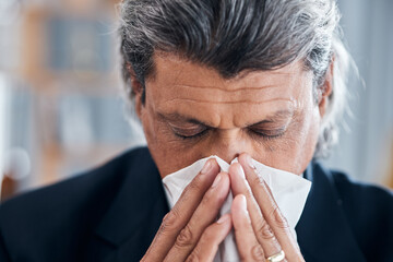 Wall Mural - Sick business man, face and blowing nose in office for cold, allergies and medical virus. Mature male worker sneezing for health problem, allergy risk and tissue for disease, sinusitis and influenza