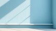 © Argun Stock Photos - Minimal abstract light blue background for product presentation. Shadow and light from windows on plaster wall