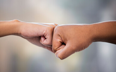 Hands, friends and fist bump outdoor in support of solidarity, teamwork or collaboration on blurred background. Hand, unity and people greeting, gesture or respect outside with power, fists and deal