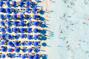 Wall Mural - aerial view on beach, people and umbrellas. vacation and adventure. europe, mediterranean sea. top v