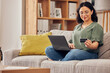 © Bettencourt/peopleimages.com - Laptop, credit card and woman of home online shopping, e commerce or fintech payment on sofa. Relax, loan and happy person on internet banking, e learning subscription and computer or web transaction