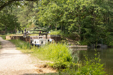 Barge Enters A Lock On The Basingstoke Canal Near To Woking In Surrey