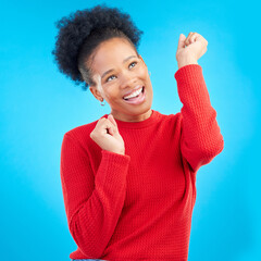 Poster - Happy woman, fist pump and celebration for winning, discount or sale against a blue studio background. Excited female person for good news, bonus promotion or lottery prize in reward or competition