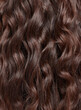 © ChasingMagic/peopleimages.com - Hair, beauty with balayage and curly hairstyle with haircare, keratin treatment and back view closeup. Person with salon style, color highlights shine and texture, growth and grooming with glamour