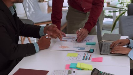 Wall Mural - Business people group meeting with project planning document on meeting table in the lounge of a modern office