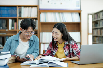 Wall Mural - Young students campus helps friend catching up and learning.