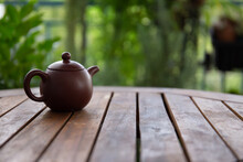 Traditional Chinese Teapot In The Garden