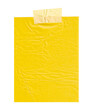 yellow paper note with tape