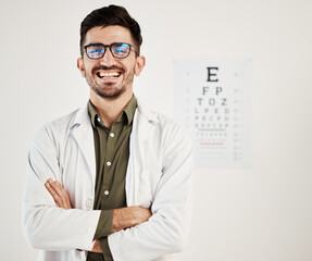 Canvas Print - Eye exam, arms crossed and portrait of man optometrist with smile, confidence and friendly service in consultation office. Ophthalmology, face and happy male eye expert proud of vision testing career