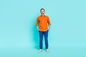 Sticker - Full body size photo cadre of confident businessman put hands pockets entrepreneur ceo company chief boss isolated on blue color background