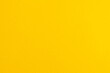 Leinwandbild Motiv Vibrant bright yellow background with rippled texture and copy space