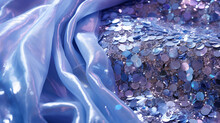 Blue Sequins And Lilac Color On The Fabric