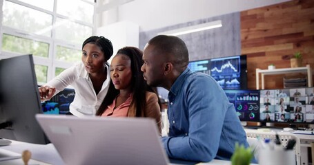 Poster - African Financial Data Analysts Using Dashboard On Screens