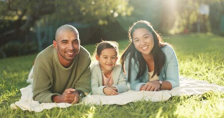 Canvas Print - Face, happy family and picnic blanket at park to relax, bonding and together on holiday vacation. Portrait, smile and mother, father and child at garden with love, care and quality time in nature