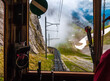Amazing view from the driver's seat of the famous world’s steepest cogwheel railway descending from the Pilatus Kulm mountain station all the way down to the valley station in Alpnachstad.