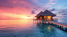 Maldives Sunset On The Beach At A Tropical Resort With Water Cabanas