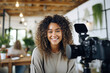 © MVProductions - Young female influencer recording a video for social media, capturing her lifestyle