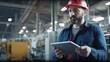 © redflower - Modern Engineer is checking machine use tablets in the factory for routine maintenance