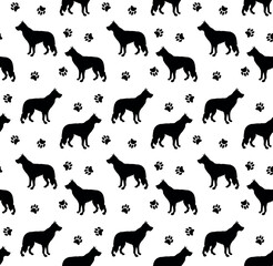 Wall Mural - Vector seamless pattern of shepherd dog silhouette and paw footprints isolated on white background