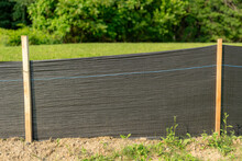 Silt Fence Fabric With Wooden Posts Installed Prior To The Start Of Construction.
