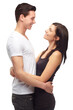 © Suresh Heyt/peopleimages.com - Love, hug and young happy couple isolated on transparent png background, romance and trust. Smile, man and woman in embrace in support, healthy relationship and future commitment together on date.