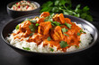 Delicious chicken tikka masala with white rice topped with prasley