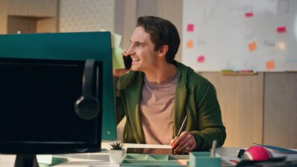 Wall Mural - Web designer consulting smartphone at workplace close up. Man drawing tablet