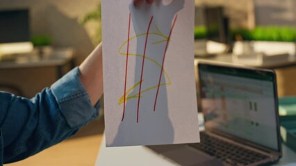 Wall Mural - Freelancer hands showing sketch at sunny office close up. Man creating at desk