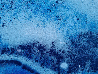 Wall Mural - blue spray paint texture on empty wall. urban background element with copy space for design