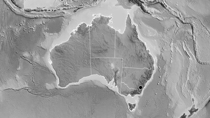 Shape of Australia with regional borders. Grayscale.