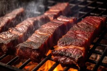Close-up Of Smoking Bbq Ribs In A Smoker
