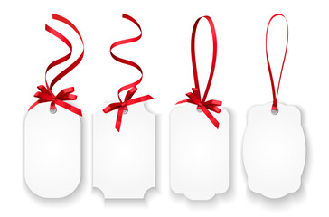 Wall Mural - white empty paper name tags, greeting cards or coupons with red shiny ribbons isolated on transparen