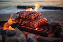 Lobster Tails Grilling On A Beach Bonfire
