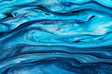 Wall Mural - Blue flowing paint texture. Marbled paper abstract background